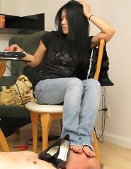 Boy dominated by heels in office
